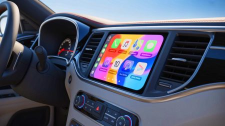 Illustration of the sleek new Apple CarPlay interface featuring the 'Liquid Glass' design and rounded app icons.