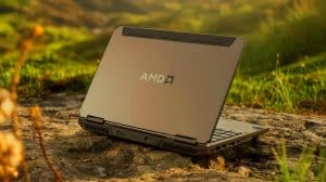 Illustration of a rugged laptop showcasing AMD-powered AI capabilities and sustainable design in challenging environments.